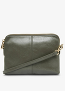 Green leather crossbody bag on a white background