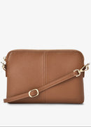 Brown leather crossbody bag with gold accents on a white background