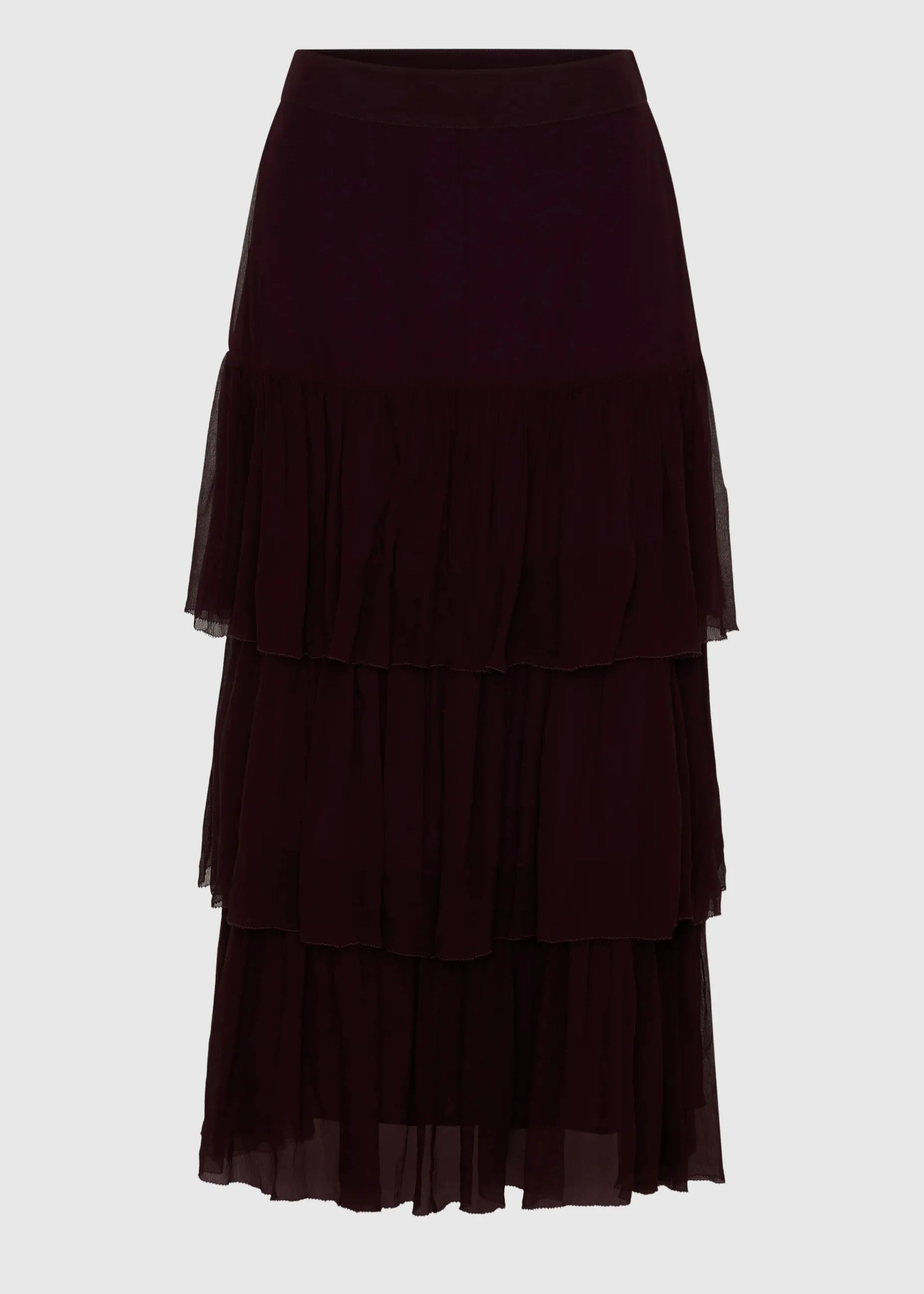 Dark purple tiered skirt on a light gray background