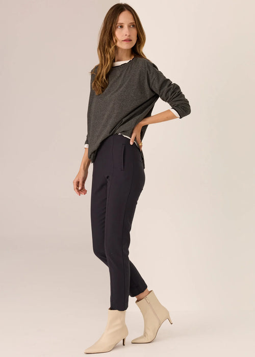Woman wearing long sleeve tee with white background