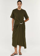 Woman modelling a olive dress on white studio background