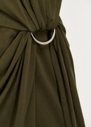 Close up of silver ring tie and draping dress,