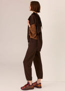 Girl in brown top with whit background
