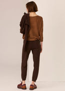 Girl in brown top with whit background