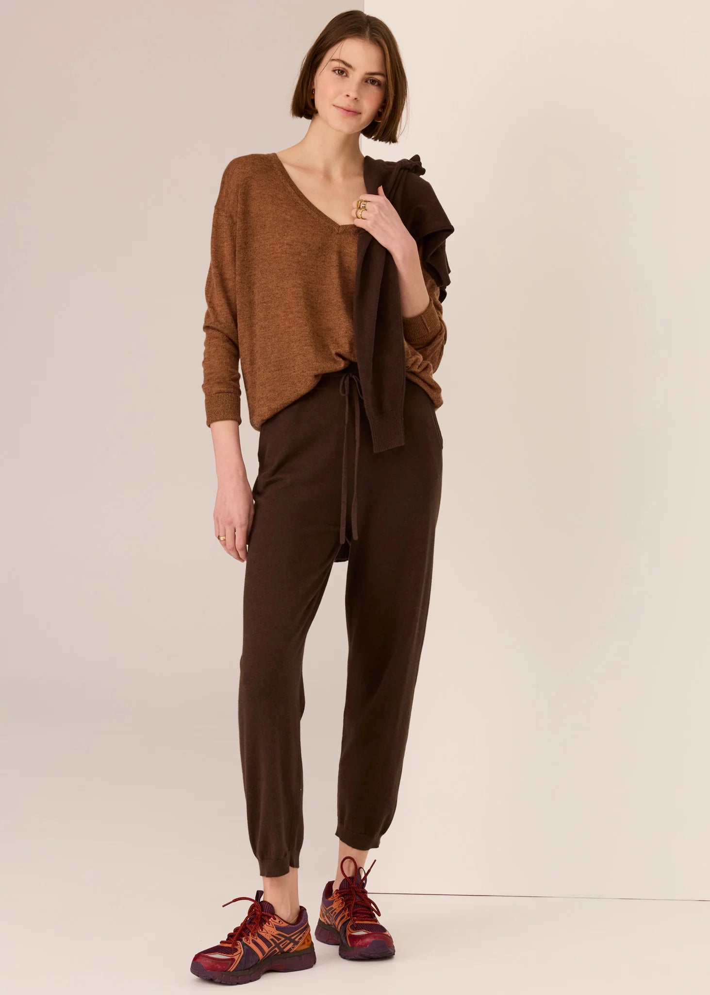 Girl in brown top with whit background