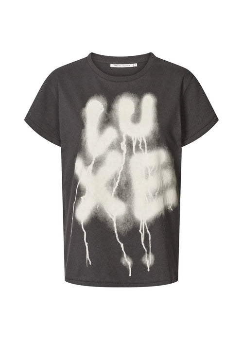 Black t-shirt with white graphic design on a white background
