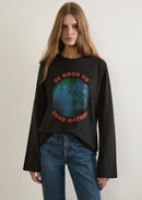 Person wearing a black t-shirt with a graphic and text, against a plain background.