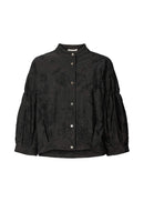 Black textured blouse with button details on a white background
