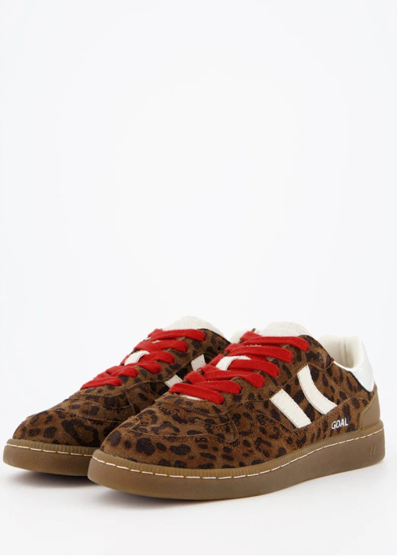 Leopard print sneakers with red laces and white accents on a white background