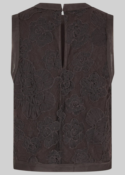 A sleeveless dark brown vest featuring a large-scale floral lace overlay and a central zipper closure, shown against a solid grey background.
