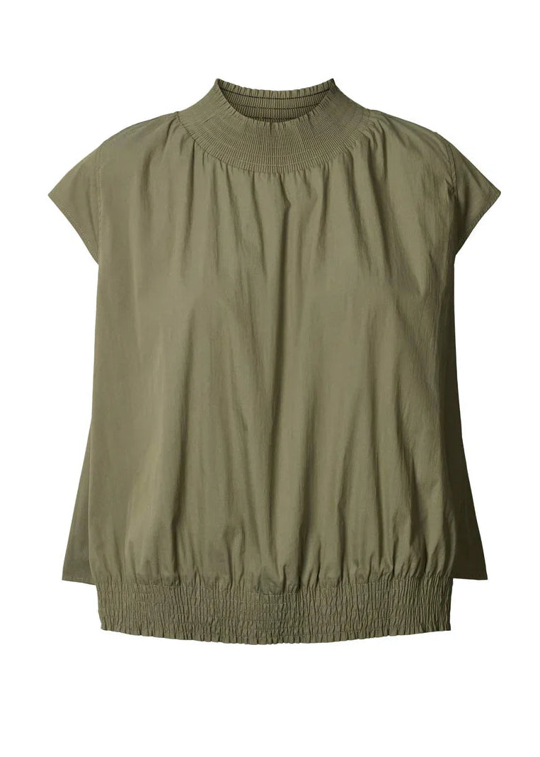 Green sleeveless top on a white background