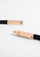 Black belt with rose gold clasp
