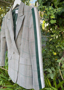Grey blazer with green stripe.