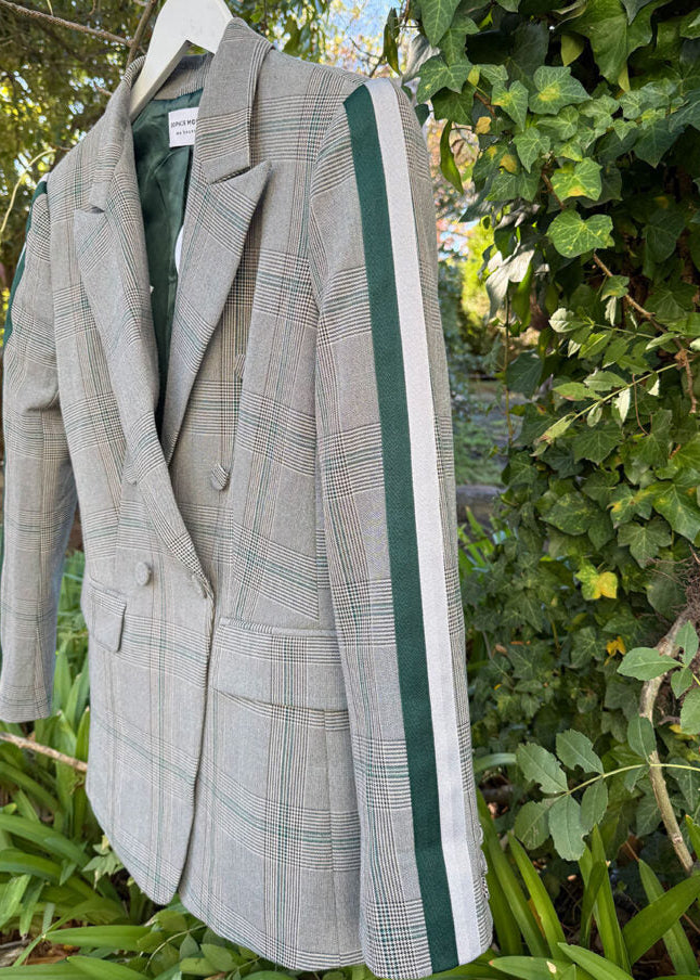 Grey blazer with green stripe.