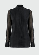 Black sheer blouse on a light gray background