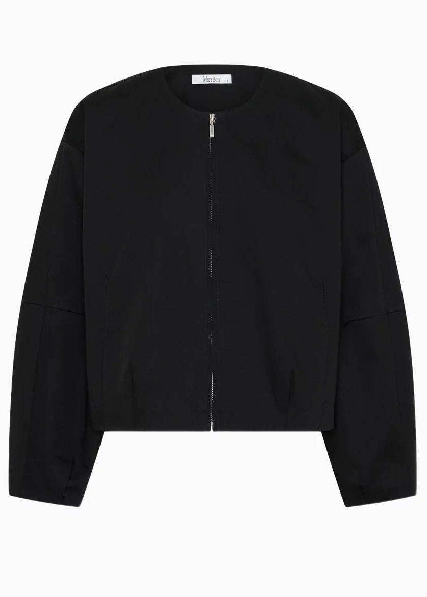 A black cropped zip-up jacket with long sleeves and a round neckline, shown flat against a plain white background.