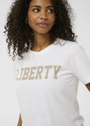 Woman wearing a white t-shirt with  a plain background