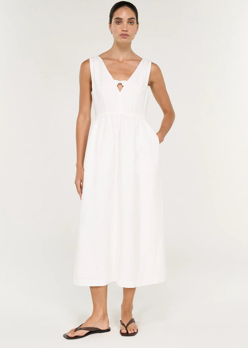 Women modelling a white midi dress on a white background