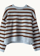 Striped sweater with brown and light blue horizontal stripes on a white background