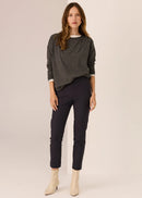 Woman wearing long sleeve tee with white background