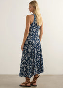 Woman in blue dress on white background