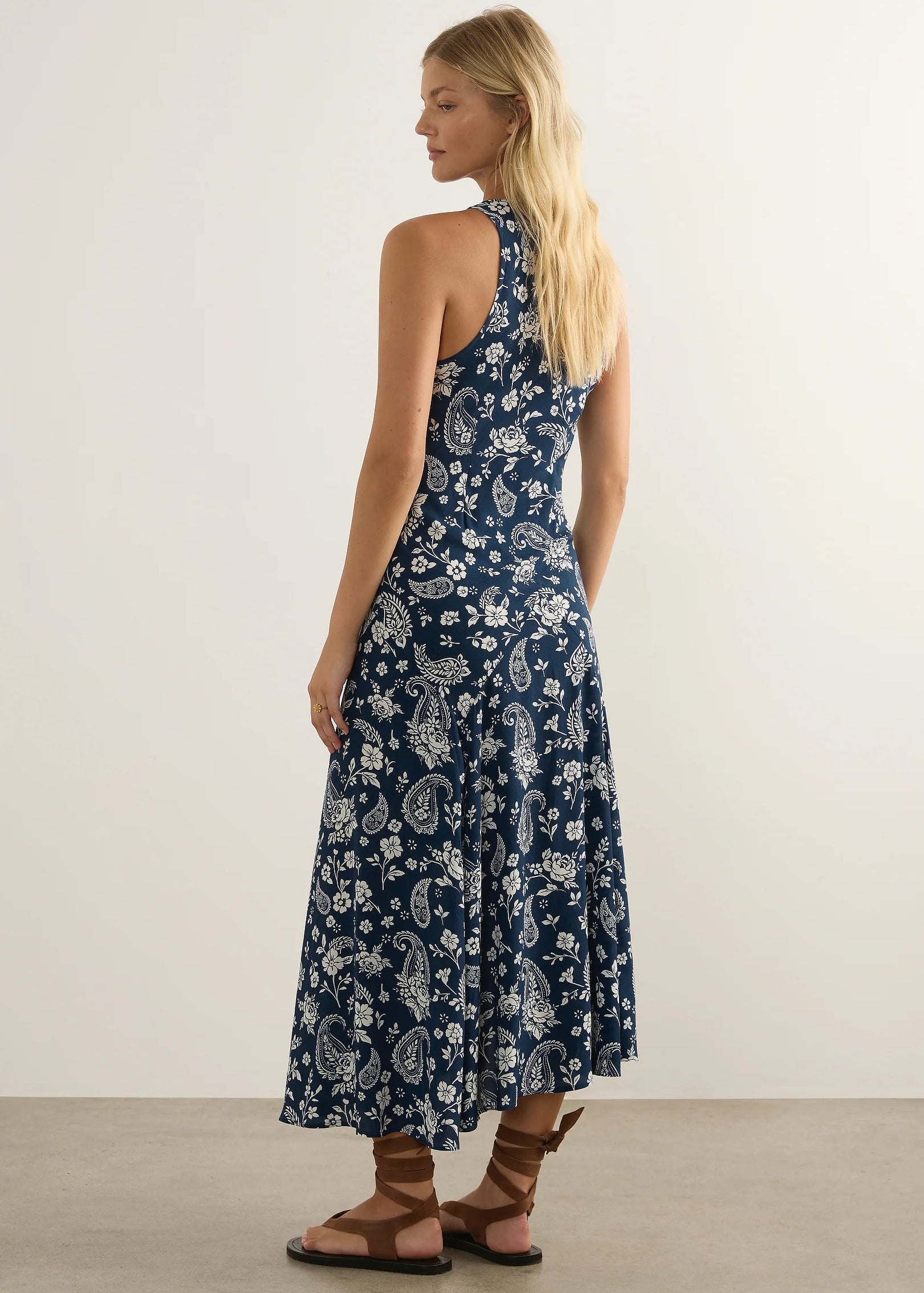 Woman in blue dress on white background