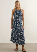 Woman in blue dress on white background