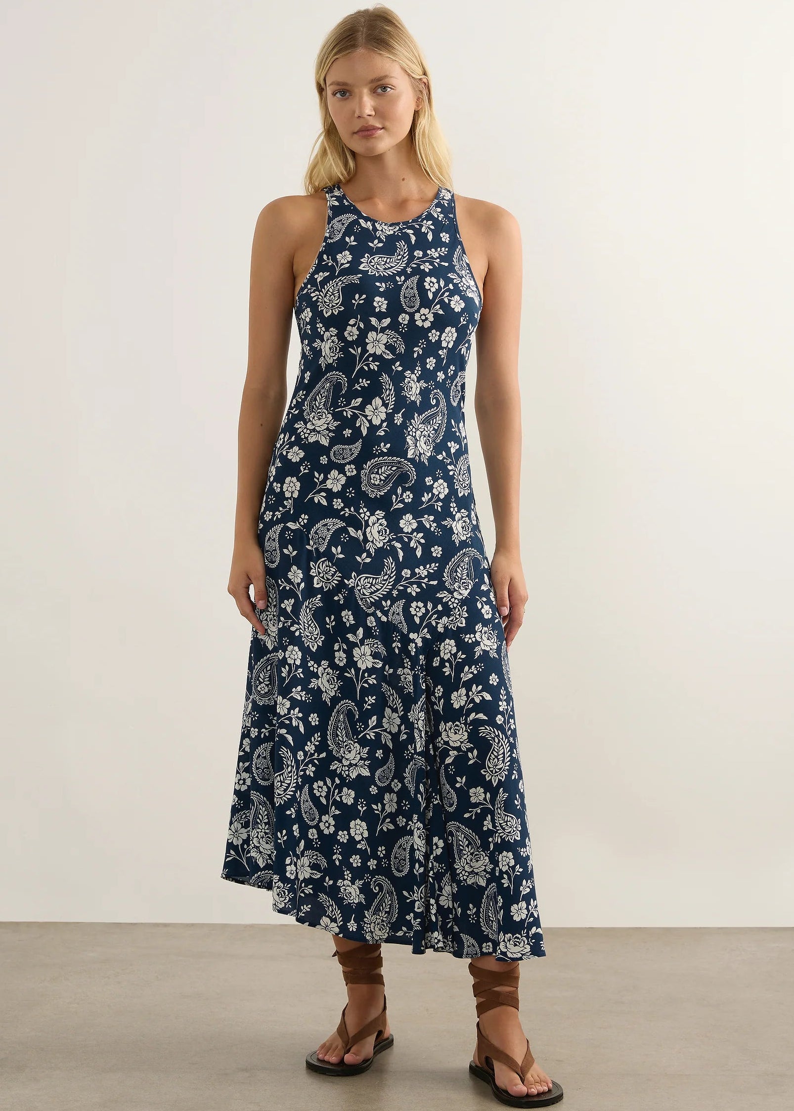 Woman in blue dress on white background