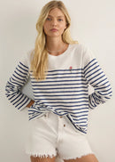 Woman wearing striped top on white background