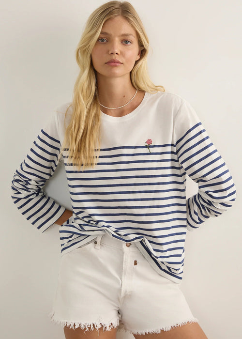 Woman wearing striped top on white background
