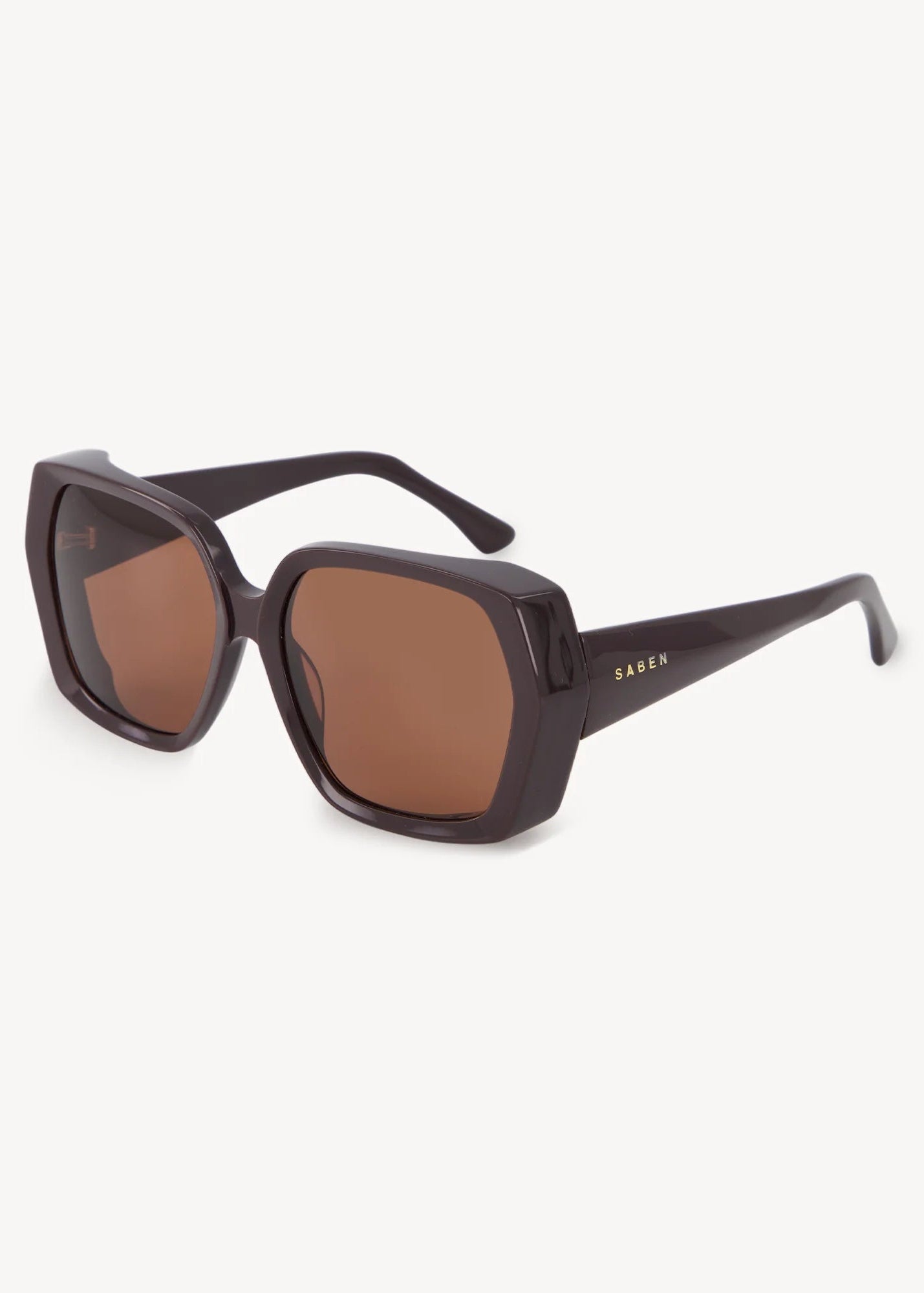 Sunglasses with brown lenses and black frame on a white background