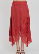 Red lace skirt on a plain background